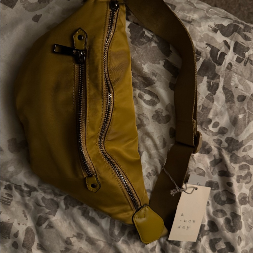 A New Day Yellow Belt Bag with Curved Shape and Metallic Zipper